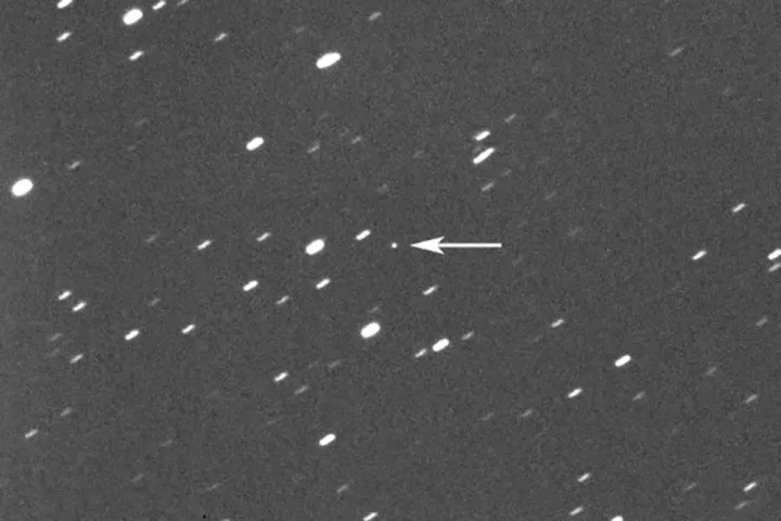 Asteroid 2023 DZ2, indicated by arrow at centre, about 1.8 million kilometres (1.1 million miles) away from the Earth on March 22, 2023.
