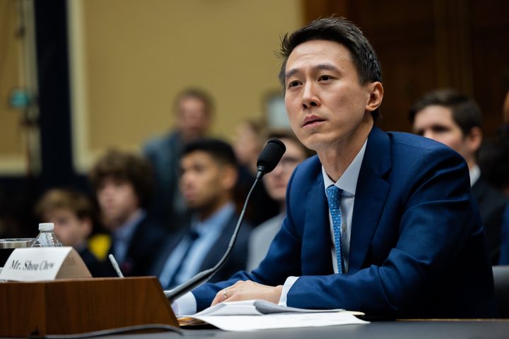 TikTok CEO Shou Zi Chew listens to questions from US representatives during his testimony at a Congressional hearing on TikTok