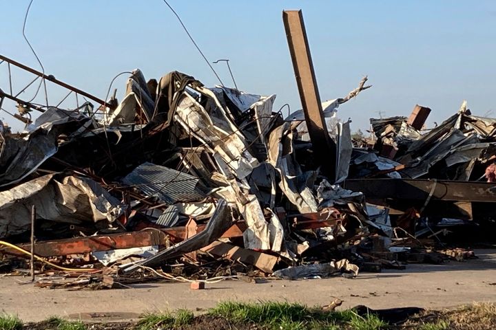 Debris covers a damaged structure in Rolling Fork, Mississippi.