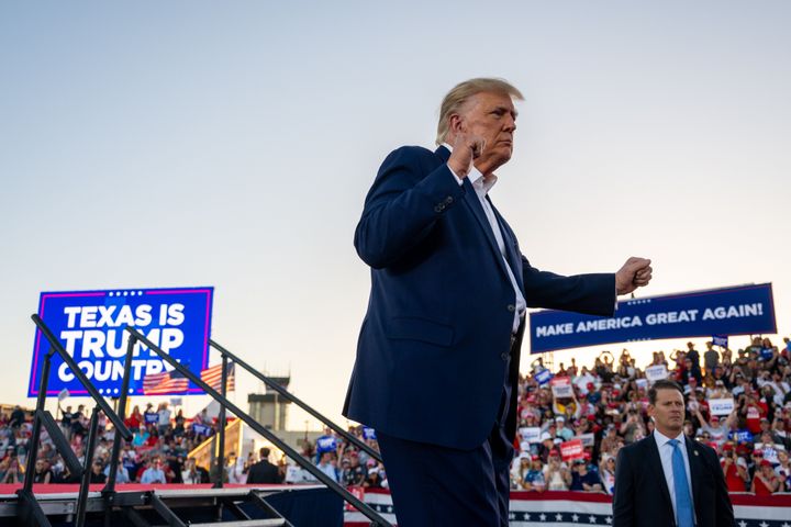 WACO, TEXAS - MARCH 25: Former U.S. President Donald Trump dances while exiting after speaking during a rally at the Waco Regional Airport on March 25, 2023 in Waco, Texas. Former U.S. president Donald Trump attended and spoke at his first rally since announcing his 2024 presidential campaign. Today in Waco also marks the 30 year anniversary of the weeks deadly standoff involving Branch Davidians and federal law enforcement. 82 Davidians were killed, and four agents left dead. (Photo by Brandon Bell/Getty Images)