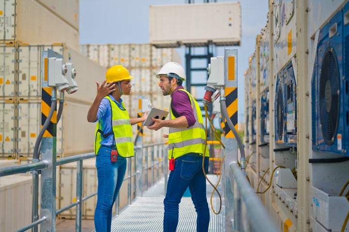 Scream and shouting on action of big argument of both workers in yard ground, dispute of both colleagues by scream on each other