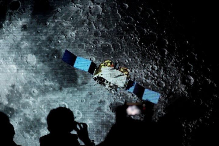  A screen shows footages of spacecraft for Chang'e-5 Mission, during an event on Chinaâs lunar exploration program, at the National Astronomical Observatories of Chinese Academy of Sciences (CAS), in Beijing, China, January 18, 2021. REUTERS/Tingshu Wang/