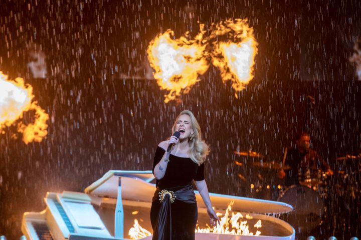 As Adele performs her 2011 hit “Set Fire to the Rain,” a literal tempest of fire and rain erupts on stage.