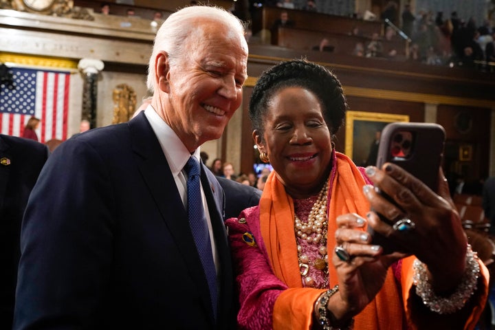 President Joe Biden takes a selfie with Rep. Sheila Jackson Lee after the State of the Union address in the House Chamber of the U.S. Capitol in Washington, D.C., on Feb. 7.