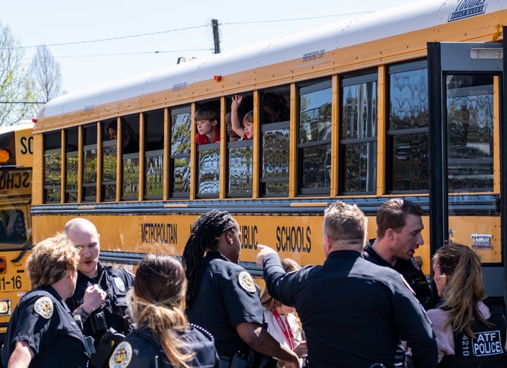 NASHVILLE, TN - MARCH 27: School buses with children arrive at Woodmont Baptist Church to be reunited with their families after a mass shooting at The Covenant School on March 27, 2023 in Nashville, Tennessee. According to initial reports, three students and three adults were killed by the shooter, a 28-year-old woman. The shooter was killed by police responding to the scene. (Photo by Seth Herald/Getty Images)