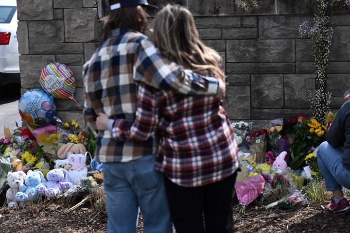 A couple pay their respects at a makeshift memorial at The Covenant School in Nashville, where six were killed Monday. If you want to help change the tide of mass shootings in the United States, you can get in touch with groups who are pushing for gun safety action in your state.
