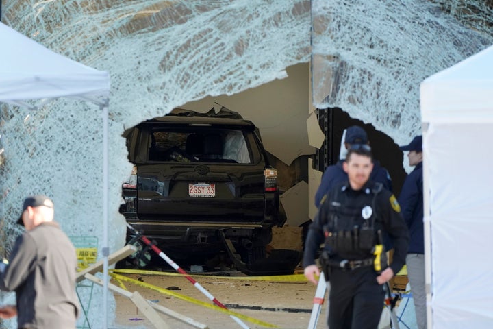 A Massachusetts man whose SUV crashed through the glass storefront of an Apple store, killing one man and injuring nearly two dozen other people, has been charged with murder, prosecutors said. (AP Photo/Steven Senne, File)