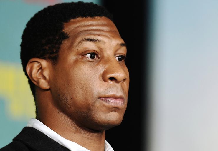 Jonathan Majors, shown here at a Los Angeles premiere of "The Harder They Fall" on Oct. 13, 2021, denies the allegations of domestic assault.