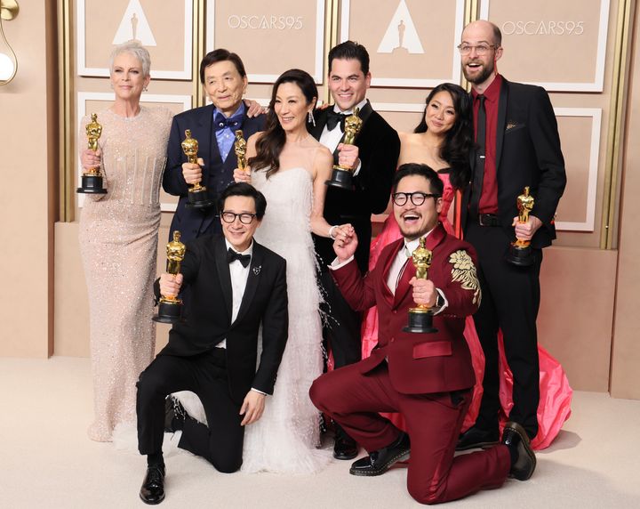 Jamie Lee Curtis, James Hong, Ke Huy Quan, Michelle Yeoh, Jonathan Wang, Daniel Kwan, Stephanie Hsu and Daniel Scheinert, winners of the Best Picture Oscar for "Everything Everywhere All at Once," pose in the press room during the 95th Annual Academy Awards on March 12, 2023.