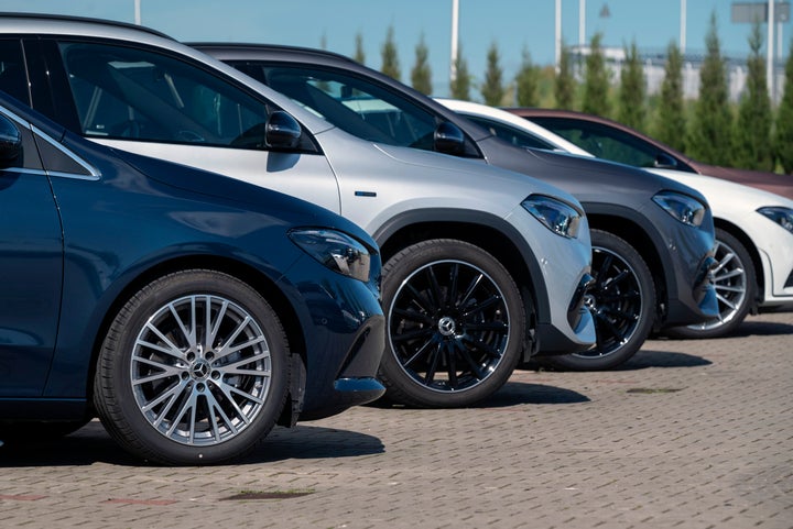 Berlin, Germany - 24th May, 2021: Mercedes-Benz vehicles on a public parking. The Mercedes-Benz is one of the most popular premium cars brand in the world.