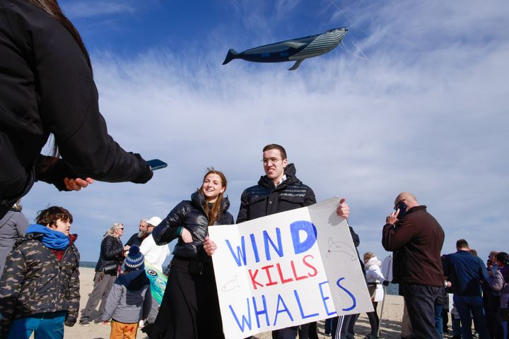 Offshore wind energy opponents gather during a "Save the Whales" rally on Feb. 19 in Point Pleasant, New Jersey.