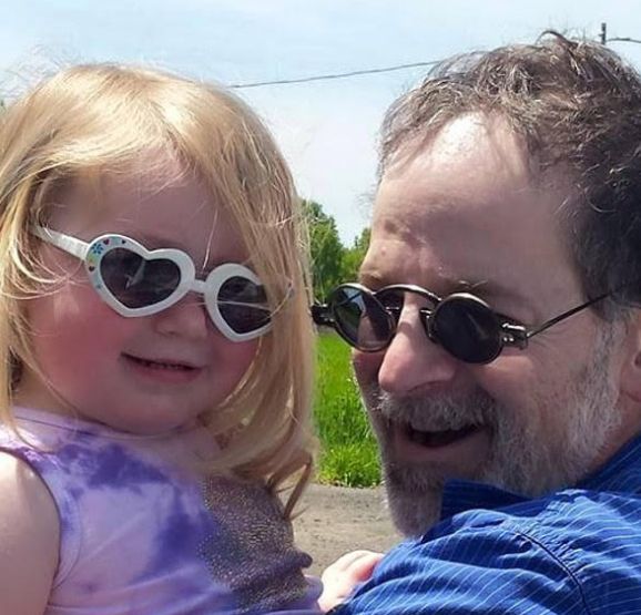 My husband and our daughter, Miriam Phoenix. “She turned out too be a manifestation of the little blonde girl he would dream of when we were at our saddest,” she writes.