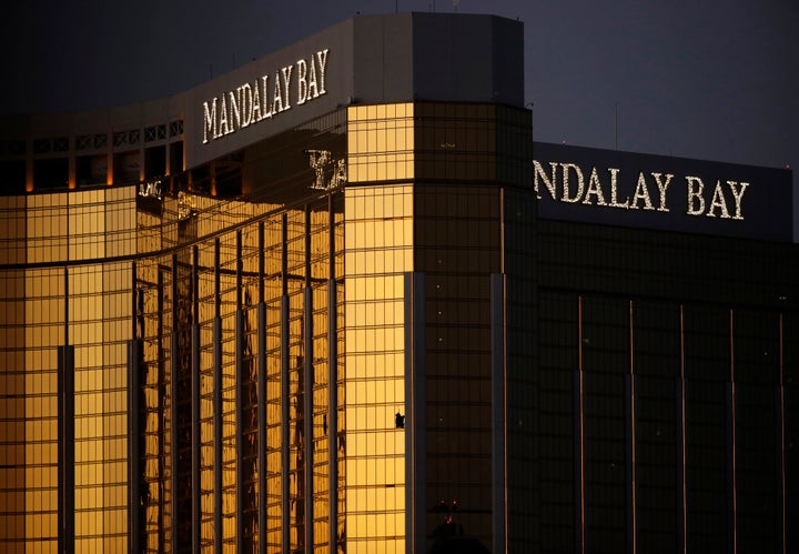 FILE - Broken windows from the Mandalay Bay resort and casino room from where Stephen Craig Paddock fired on a nearby music festival are shown in Las Vegas, Oct. 3, 2017.