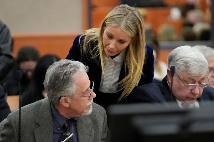 Gwyneth Paltrow speaks with retired optometrist Terry Sanderson, left, as she walks out of the courtroom following the reading of the verdict in their lawsuit trial.