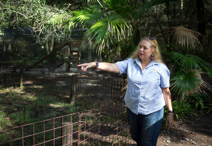 Carole Baskin, founder of Big Cat Rescue, walks the property near Tampa, Fla., July 20, 2017.