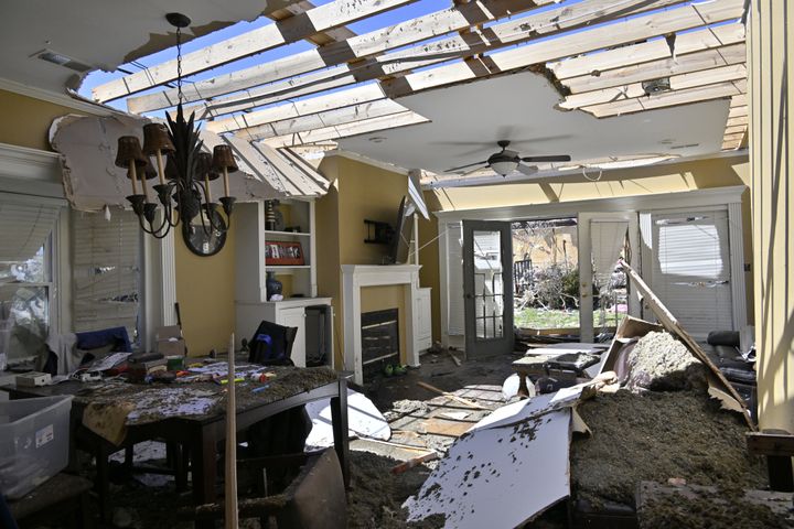A view of damage as residents clean up after the devastating tornadoes in Little Rock, Arkansas on Saturday.