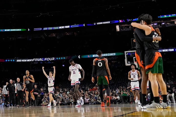 Connecticut guard Andrew Hurley (20) celebrates after scoring during their win against Miami in the Final Four on Saturday.