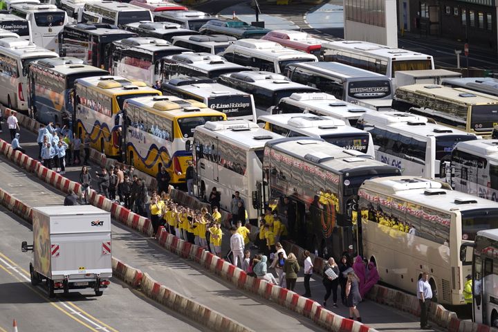 Coaches wait to enter the Port of Dover in Kent after extra sailings were run overnight to try and clear the backlog which has left passengers stuck in Easter traffic for hours. Picture date: Sunday April 2, 2023.