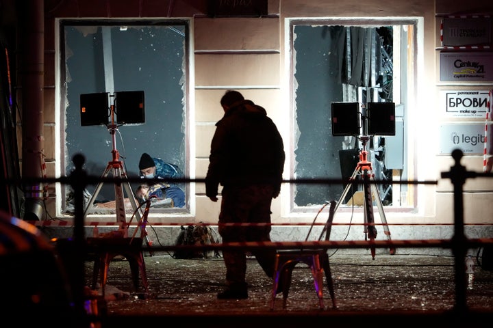 Russian investigators work at the site of an explosion at a cafe in St. Petersburg, Russia, Sunday, April 2, 2023. An explosion tore through a cafe in the Russian city of St. Petersburg on Sunday, and preliminary reports suggested a prominent military blogger was killed and more than a dozen people were injured. (AP Photo) qhiukiuiqxhinv