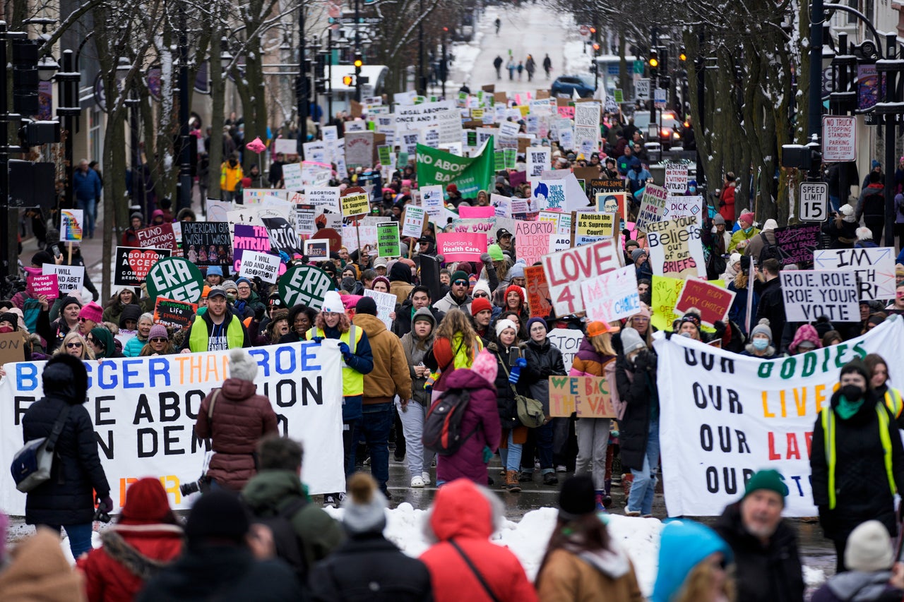 Protesters make their way to the Wisconsin Capitol Rotunda during a January march in support of overturning Wisconsin's near total ban on abortion.