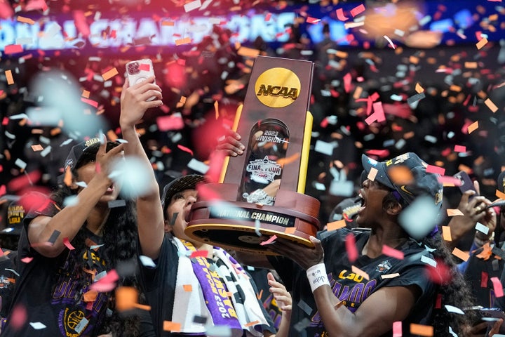 LSU players celebrate after the NCAA Women's Final Four championship basketball game against Iowa. LSU won 102-85.