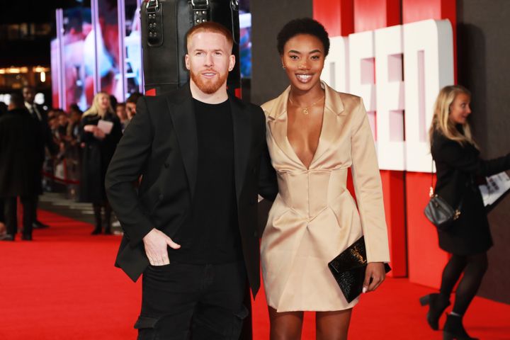Neil Jones and Chyna Mills at the Creed III premiere