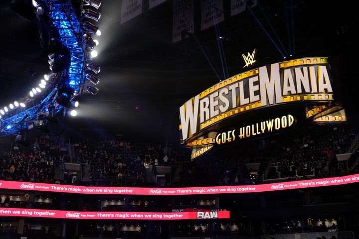 A WrestleMania sign hangs over the crowd during the WWE Monday Night RAW event on March 6, 2023, in Boston. 