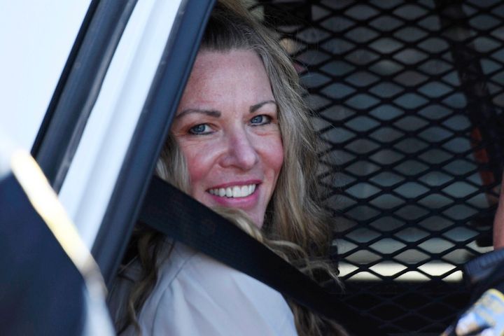 Lori Vallow Daybell sits in a police car after a hearing at the Fremont County Courthouse in St. Anthony, Idaho, on Aug. 16, 2022. 