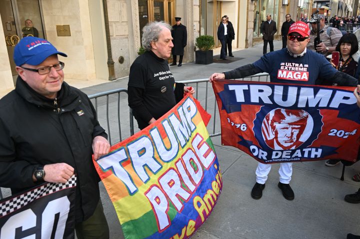 Trump supporters hold flags outside the Trump Tower on April 3, 2023 in New York City. 