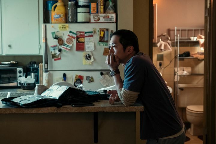 Steven Yeun as Danny, a contractor whose road rage incident with a stranger named Amy (Ali Wong) turns into a full-blown feud, in the Netflix series "Beef."