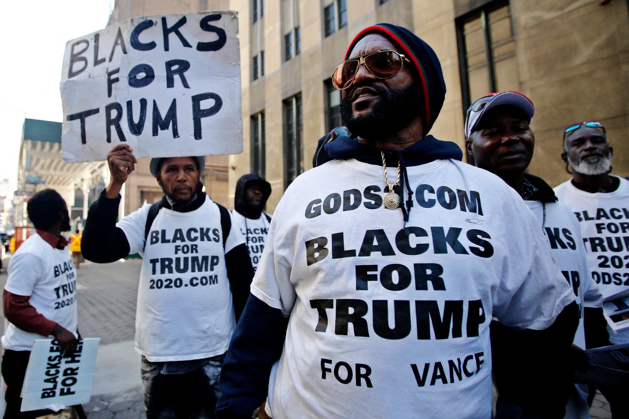A group identifying themselves as "Blacks for Trump" is seen in New York City on Tuesday.