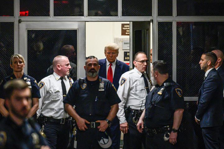 Former US president Donald Trump arrives at the courtroom at the Manhattan Criminal Court in New York before his hearing.