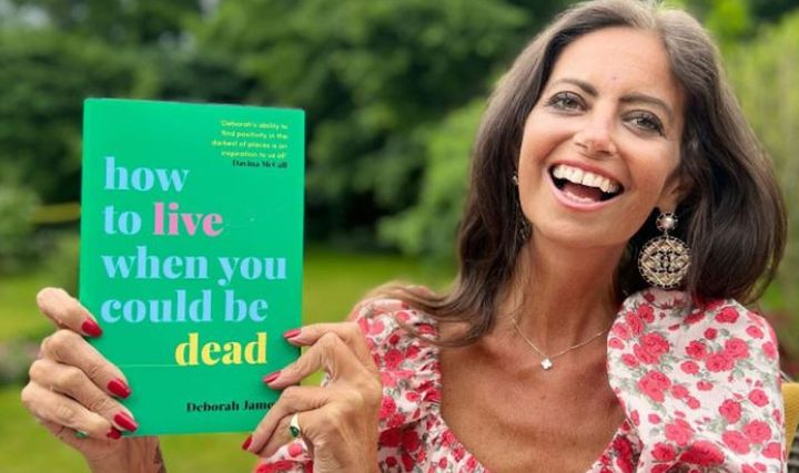 Dame Deborah James with her posthumously published book which debuted at number one in the UK, How To Live When You Could Be Dead 