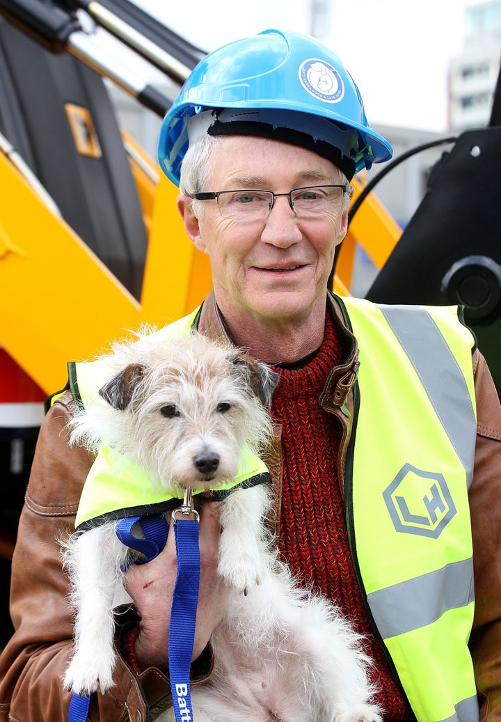 Paul O'Grady holds a dog at a campaign to provide updated kennels is launched at Battersea Dogs & Cats Home on March 20, 2014 in London, England. (Photo by Danny Martindale/WireImage)