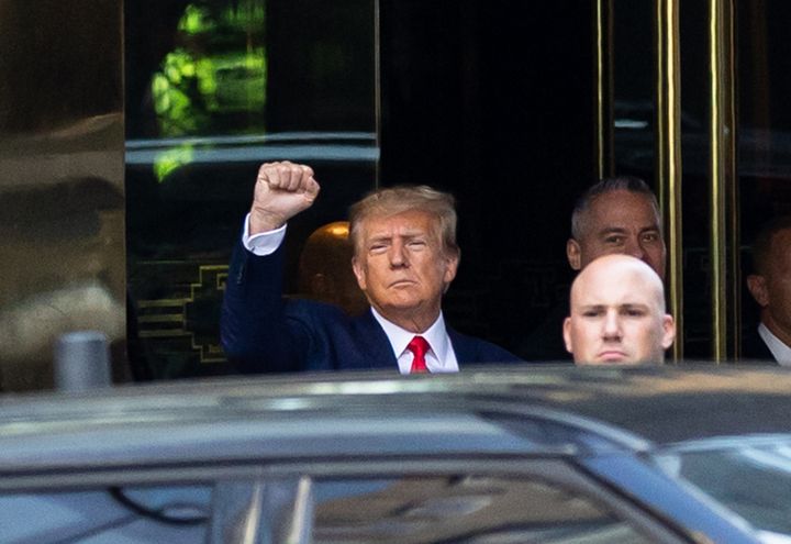 As he left Trump Towers to head to the courtroom, there was an "undertone of defiance" in former President Donald Trump's raised fist.