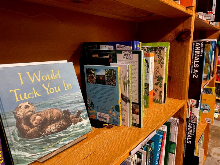 The children's book "I Would Tuck You In," illustrated by Mitchell Thomas Watley, is shown at a bookstore in Portland, Ore. in this April 5, 2023, photo.