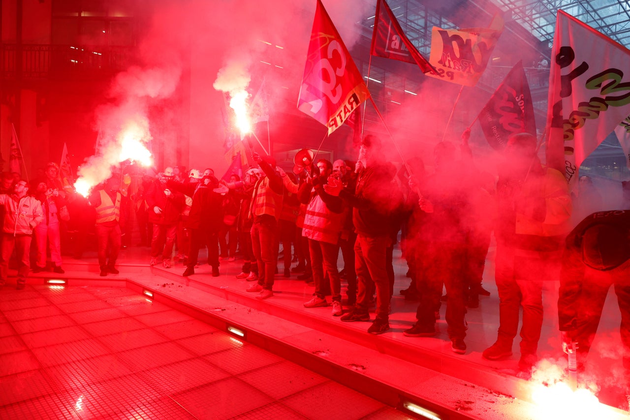 Striking railway workers demonstrate against BlackRock.