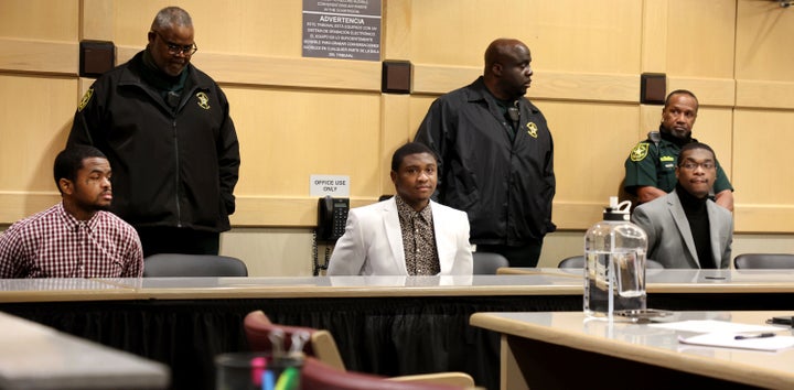 CORRECTS THE POSITIONS OF WILLIAMS AND NEWSOME - Dedrick Williams, left, Trayvon Newsome, center, and Michael Boatwright were found guilty of first-degree murder of XXXTentacion at the Broward County Courthouse in Fort Lauderdale on Monday, March 20, 2023. (Carline Jean/South Florida Sun-Sentinel via AP, Pool)