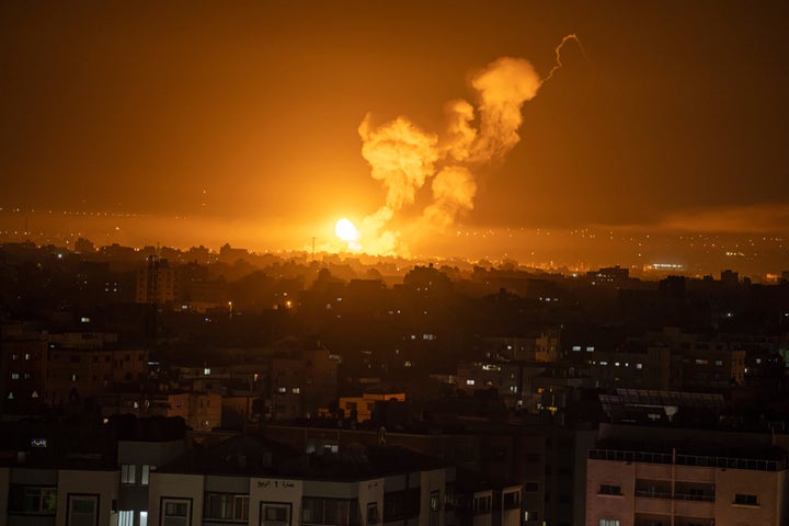 Fire and smoke rise following an Israeli airstrike in central Gaza Strip, Friday, April 7, 2023. The Israeli military has struck targets in the Gaza Strip, pushing the region toward a wider conflagration after a day of rocket fire along the country's northern and southern borders. The fighting follows two days of unrest at Jerusalem's most sensitive holy site. As Israeli aircraft began striking Gaza, Palestinian militants quickly fired off a new barrage of rockets, setting off air raid sirens across southern Israel. (AP Photo/Fatima Shbair)