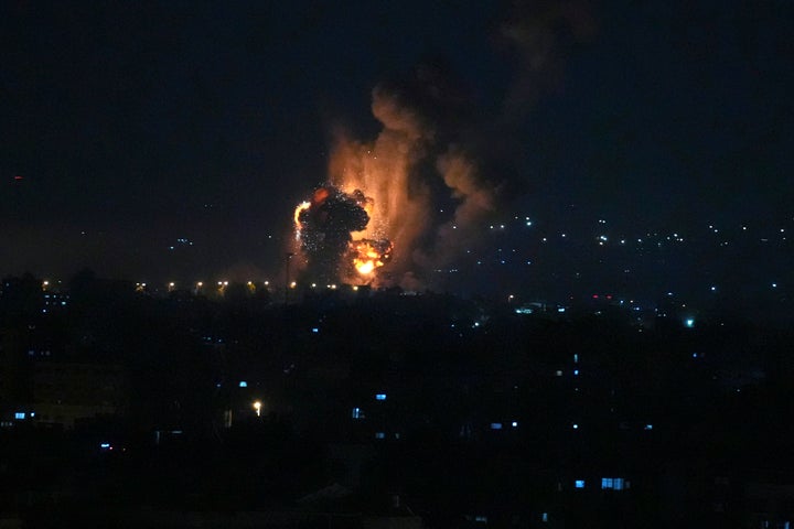 Smoke and fire rise from an explosion caused by an Israeli airstrike on Gaza City, early Friday, April 7, 2023. The Israeli military struck targets in the Gaza Strip early Friday, pushing the region closer toward a wider conflagration after a day of rocket fire along the country's northern and southern borders following two days of unrest at Jerusalem's most sensitive holy site. (AP Photo/Adel Hana)