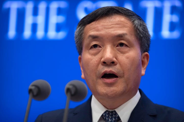 Shen Hongbing, the director of the Chinese Center for Disease Control and Prevention, speaks at a press conference on the origins of COVID-19 at the State Council Information Office in Beijing, Saturday, April 8, 2023. (AP Photo/Mark Schiefelbein)