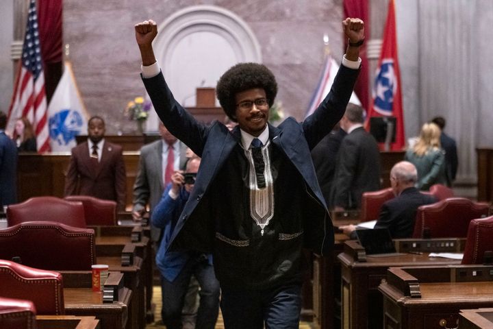 Former Rep. Justin Pearson, D-Memphis, raises his fists as he leaves the House chamber after he is expelled from the legislature Thursday, April 6, 2023, in Nashville, Tenn. Tennessee Republicans ousted two of three House Democrats for using a bullhorn to shout support for pro-gun control protesters in the House chamber. (AP Photo/George Walker IV)
