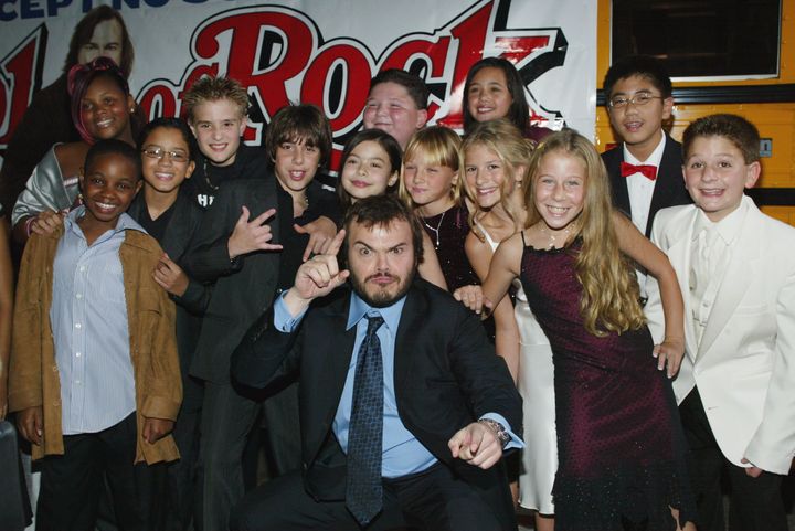 Jack Black and fellow cast members attend the premiere of "School of Rock" at the Cinerama Dome in 2003.