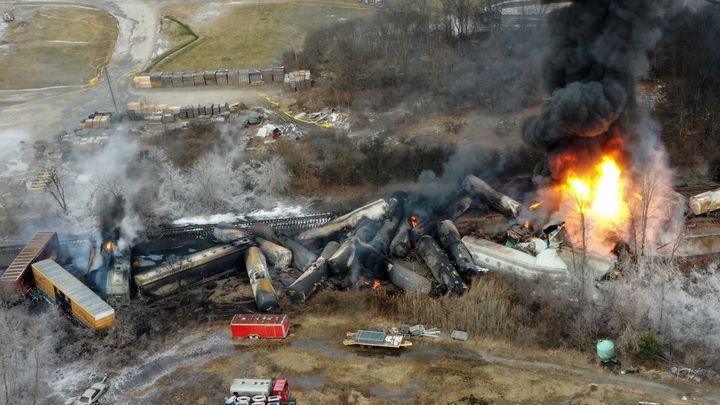 Portions of a Norfolk Southern freight train that derailed in East Palestine, Ohio, are pictured burning on Feb. 4, 2023.