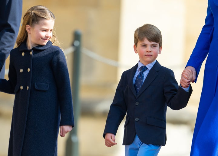 Charlotte looks over at her younger brother on Easter Sunday. 