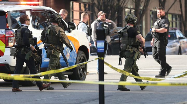 Police deploy at the scene of a mass shooting near Slugger Field baseball stadium in downtown Louisville, Kentucky.