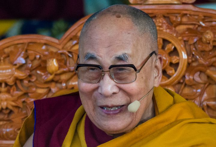 Tibetan spiritual leader the Dalai Lama smiles during his sermon at the Tsuglakhang temple in Dharamshala, India.