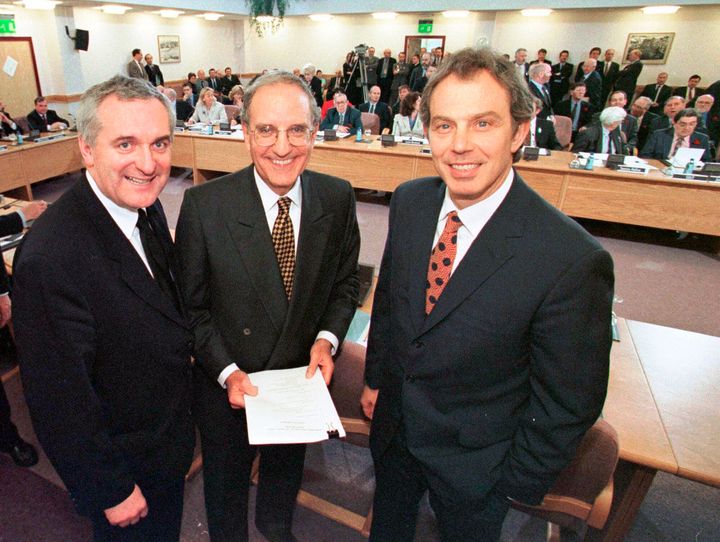 Then UK PM Tony Blair, US Senator George Mitchell, and Irish Prime Minister Bertie Ahern after they signed the Good Friday Agreement in 1998