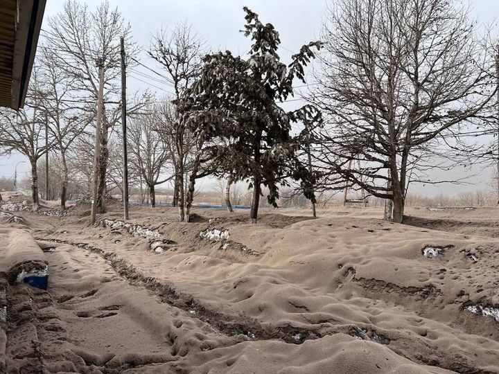 A street covered in volcanic dust following the eruption of Shiveluch volcano in the settlement of Klyuchi on the Kamchatka Peninsula, Russia April 11, 2023. Official page of Oleg Bondarenko, Head of the Ust-Kamchatsky municipal district/Handout via REUTERS