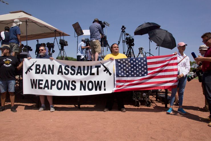 Demonstrators call for a ban on assault rifles in August 2019 during President Donald Trump's visit to El Paso, Texas, following back-to-back mass shootings there and in Dayton, Ohio.